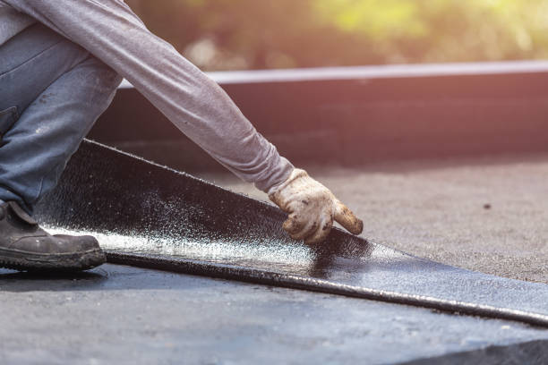 Professional Basement Waterproofing technician working in Jonesville, VA